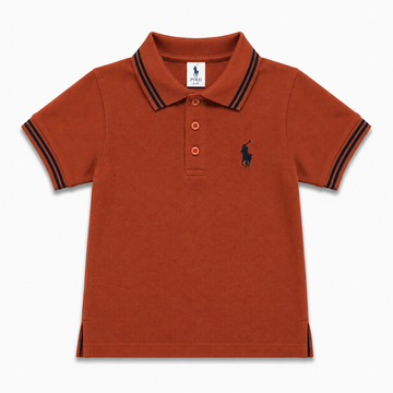 A toddler's short-sleeve polo shirt in terracotta orange, featuring navy blue double-stripe trim on the collar and cuffs, and the signature embroidered navy blue Polo pony logo on the left chest.