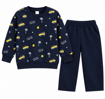 A children's two-piece pajama set featuring a navy blue sweatshirt and matching pants. The sweatshirt is decorated with a playful pattern of yellow vintage cars, white palm trees, and 'LET'S GO SUNNING' text.