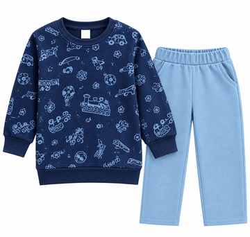 A two-piece children's sweatshirt and pants set on a plain white background. The long-sleeve top is navy blue with a light blue pattern of toy vehicles and drawings, while the pants are light blue.