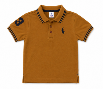 A kids' short-sleeve polo shirt in a warm camel brown color, featuring a navy blue embroidered polo player logo on the left chest, a navy blue number 3 on the right sleeve, and navy blue double-stripe accents on the collar and sleeve cuffs.