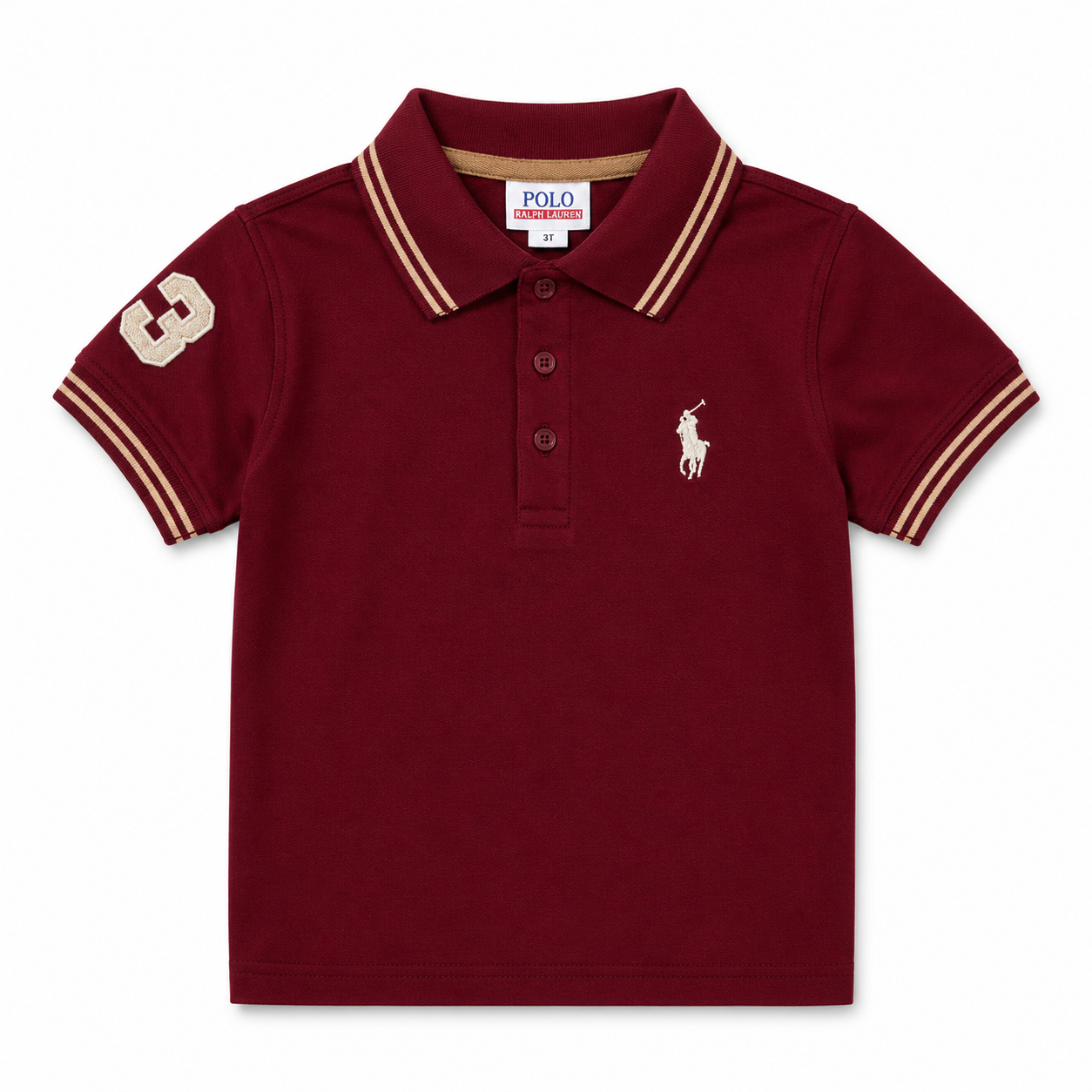A kids' short-sleeve polo shirt in maroon, featuring cream and tan striped trim on the collar and sleeve cuffs, a cream number 3 on the right sleeve, and the classic Polo Ralph Lauren pony logo embroidered on the left chest.